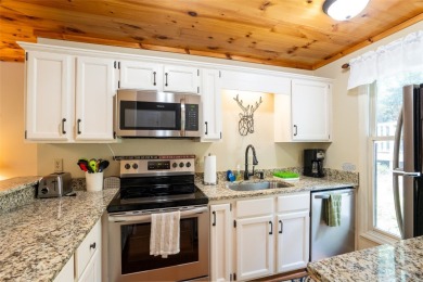 Experience a mountain retreat that makes life simple, secure on Sapphire National Golf Club in North Carolina - for sale on GolfHomes.com, golf home, golf lot