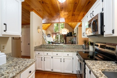 Experience a mountain retreat that makes life simple, secure on Sapphire National Golf Club in North Carolina - for sale on GolfHomes.com, golf home, golf lot