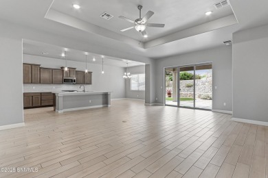 This beautifully landscaped 4-bedroom, 3-bath home spans 2,435 on Sonoma Ranch Golf Course in New Mexico - for sale on GolfHomes.com, golf home, golf lot