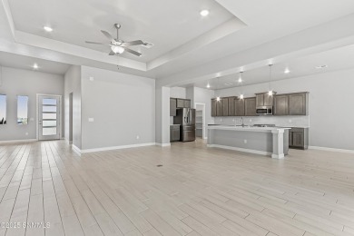 This beautifully landscaped 4-bedroom, 3-bath home spans 2,435 on Sonoma Ranch Golf Course in New Mexico - for sale on GolfHomes.com, golf home, golf lot