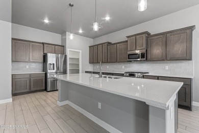 This beautifully landscaped 4-bedroom, 3-bath home spans 2,435 on Sonoma Ranch Golf Course in New Mexico - for sale on GolfHomes.com, golf home, golf lot