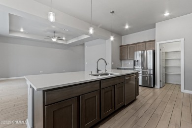 This beautifully landscaped 4-bedroom, 3-bath home spans 2,435 on Sonoma Ranch Golf Course in New Mexico - for sale on GolfHomes.com, golf home, golf lot