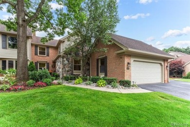 Nestled along a picturesque golf course and completely updated on Oak Pointe Country Club in Michigan - for sale on GolfHomes.com, golf home, golf lot