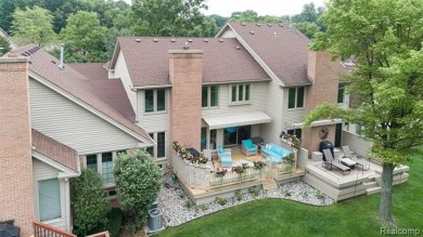 Nestled along a picturesque golf course and completely updated on Oak Pointe Country Club in Michigan - for sale on GolfHomes.com, golf home, golf lot