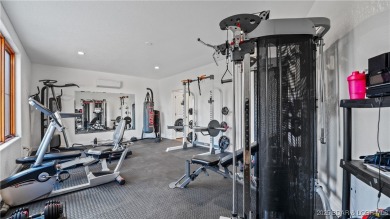 Welcome to a one-of-a-kind luxury estate in a gated Osage Beach on Sycamore Creek Golf Club in Missouri - for sale on GolfHomes.com, golf home, golf lot