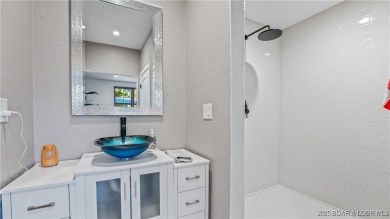 Welcome to a one-of-a-kind luxury estate in a gated Osage Beach on Sycamore Creek Golf Club in Missouri - for sale on GolfHomes.com, golf home, golf lot