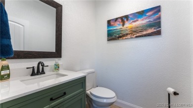 Welcome to a one-of-a-kind luxury estate in a gated Osage Beach on Sycamore Creek Golf Club in Missouri - for sale on GolfHomes.com, golf home, golf lot