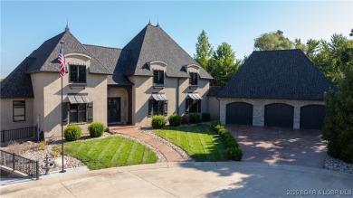 Welcome to a one-of-a-kind luxury estate in a gated Osage Beach on Sycamore Creek Golf Club in Missouri - for sale on GolfHomes.com, golf home, golf lot