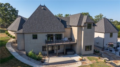Welcome to a one-of-a-kind luxury estate in a gated Osage Beach on Sycamore Creek Golf Club in Missouri - for sale on GolfHomes.com, golf home, golf lot
