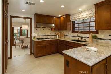 Tucked within the highly desirable Bixby Village community, this on Bixby Village Golf Course in California - for sale on GolfHomes.com, golf home, golf lot