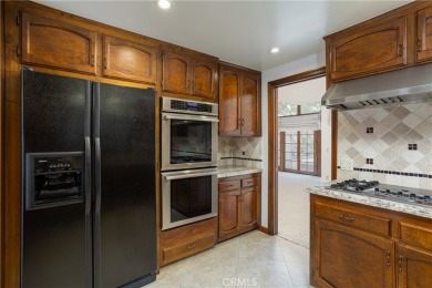 Tucked within the highly desirable Bixby Village community, this on Bixby Village Golf Course in California - for sale on GolfHomes.com, golf home, golf lot