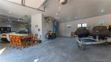 Welcome to a one-of-a-kind luxury estate in a gated Osage Beach on Sycamore Creek Golf Club in Missouri - for sale on GolfHomes.com, golf home, golf lot