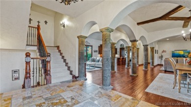 Welcome to a one-of-a-kind luxury estate in a gated Osage Beach on Sycamore Creek Golf Club in Missouri - for sale on GolfHomes.com, golf home, golf lot