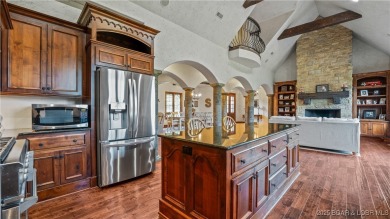 Welcome to a one-of-a-kind luxury estate in a gated Osage Beach on Sycamore Creek Golf Club in Missouri - for sale on GolfHomes.com, golf home, golf lot