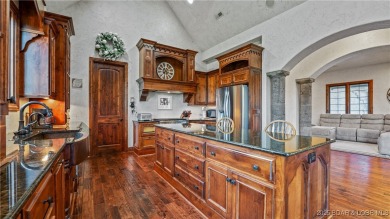 Welcome to a one-of-a-kind luxury estate in a gated Osage Beach on Sycamore Creek Golf Club in Missouri - for sale on GolfHomes.com, golf home, golf lot