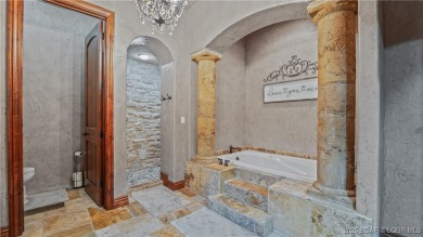 Welcome to a one-of-a-kind luxury estate in a gated Osage Beach on Sycamore Creek Golf Club in Missouri - for sale on GolfHomes.com, golf home, golf lot