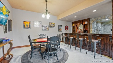 Welcome to a one-of-a-kind luxury estate in a gated Osage Beach on Sycamore Creek Golf Club in Missouri - for sale on GolfHomes.com, golf home, golf lot