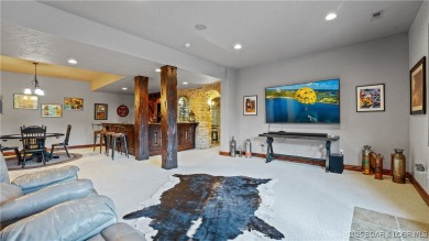 Welcome to a one-of-a-kind luxury estate in a gated Osage Beach on Sycamore Creek Golf Club in Missouri - for sale on GolfHomes.com, golf home, golf lot