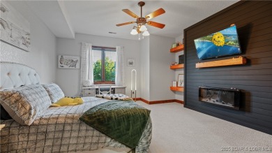 Welcome to a one-of-a-kind luxury estate in a gated Osage Beach on Sycamore Creek Golf Club in Missouri - for sale on GolfHomes.com, golf home, golf lot