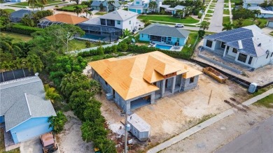 Welcome to paradise! This luxury, brand new home is nearing on Island Country Club in Florida - for sale on GolfHomes.com, golf home, golf lot