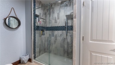 Welcome to a one-of-a-kind luxury estate in a gated Osage Beach on Sycamore Creek Golf Club in Missouri - for sale on GolfHomes.com, golf home, golf lot