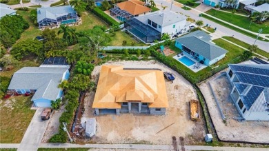 Welcome to paradise! This luxury, brand new home is nearing on Island Country Club in Florida - for sale on GolfHomes.com, golf home, golf lot