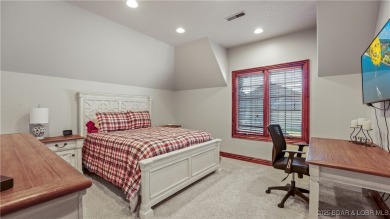 Welcome to a one-of-a-kind luxury estate in a gated Osage Beach on Sycamore Creek Golf Club in Missouri - for sale on GolfHomes.com, golf home, golf lot