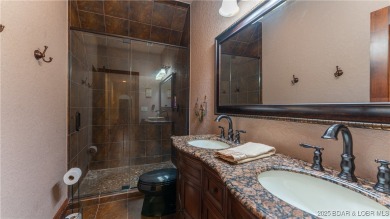 Welcome to a one-of-a-kind luxury estate in a gated Osage Beach on Sycamore Creek Golf Club in Missouri - for sale on GolfHomes.com, golf home, golf lot