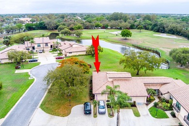 Discover this two-bedroom, two-bath end unit in Quail Meadows at on Martin Downs Country Club in Florida - for sale on GolfHomes.com, golf home, golf lot