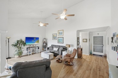 Discover this two-bedroom, two-bath end unit in Quail Meadows at on Martin Downs Country Club in Florida - for sale on GolfHomes.com, golf home, golf lot