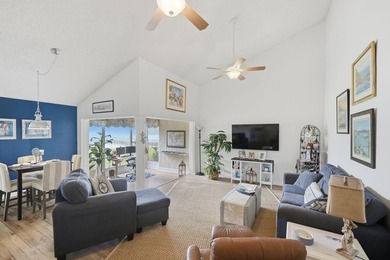 Discover this two-bedroom, two-bath end unit in Quail Meadows at on Martin Downs Country Club in Florida - for sale on GolfHomes.com, golf home, golf lot