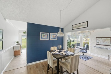 Discover this two-bedroom, two-bath end unit in Quail Meadows at on Martin Downs Country Club in Florida - for sale on GolfHomes.com, golf home, golf lot