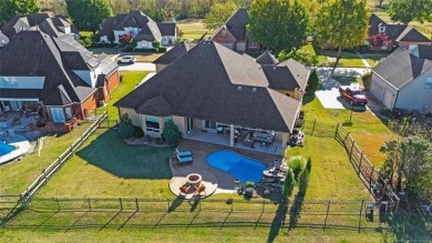 Charming stucco/stone home by White Hawk on 1/3 acre. Office on White Hawk Golf Club in Oklahoma - for sale on GolfHomes.com, golf home, golf lot