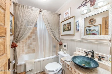 Nestled in the maritime forest of Pine Knoll Shores, this island on The Country Club of the Crystal Coast in North Carolina - for sale on GolfHomes.com, golf home, golf lot