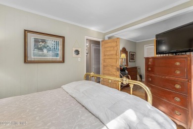 Nestled in the maritime forest of Pine Knoll Shores, this island on The Country Club of the Crystal Coast in North Carolina - for sale on GolfHomes.com, golf home, golf lot