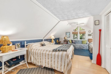Nestled in the maritime forest of Pine Knoll Shores, this island on The Country Club of the Crystal Coast in North Carolina - for sale on GolfHomes.com, golf home, golf lot