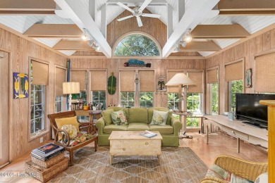Nestled in the maritime forest of Pine Knoll Shores, this island on The Country Club of the Crystal Coast in North Carolina - for sale on GolfHomes.com, golf home, golf lot