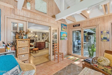 Nestled in the maritime forest of Pine Knoll Shores, this island on The Country Club of the Crystal Coast in North Carolina - for sale on GolfHomes.com, golf home, golf lot