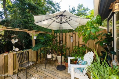 Nestled in the maritime forest of Pine Knoll Shores, this island on The Country Club of the Crystal Coast in North Carolina - for sale on GolfHomes.com, golf home, golf lot