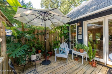 Nestled in the maritime forest of Pine Knoll Shores, this island on The Country Club of the Crystal Coast in North Carolina - for sale on GolfHomes.com, golf home, golf lot