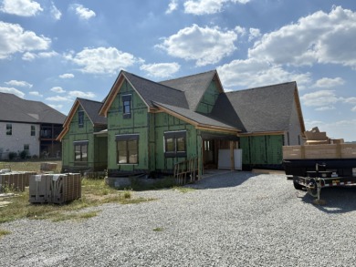 Stunning new construction located in a premier gated golf course on The Bull At Boones Trace in Kentucky - for sale on GolfHomes.com, golf home, golf lot