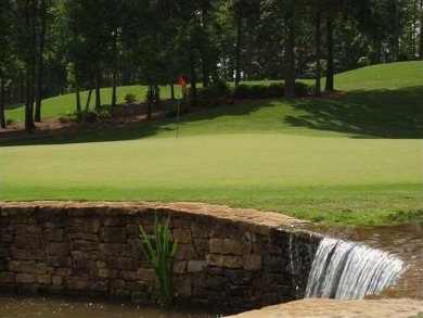 At 5.35 +/- acres, you can build just about any home.  This lots on Hawks Ridge Golf Club in Georgia - for sale on GolfHomes.com, golf home, golf lot