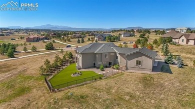 CUSTOM HOME* MAIN LEVEL LIVING * EXQUISITE VIEWS * 5-CAR on Kings Deer Golf Club in Colorado - for sale on GolfHomes.com, golf home, golf lot