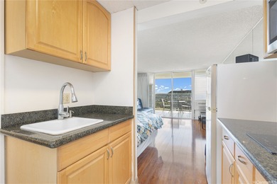 This fully furnished studio unit at Island Colony offers an on Ala Wai Golf Course in Hawaii - for sale on GolfHomes.com, golf home, golf lot