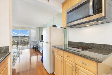 This fully furnished studio unit at Island Colony offers an on Ala Wai Golf Course in Hawaii - for sale on GolfHomes.com, golf home, golf lot