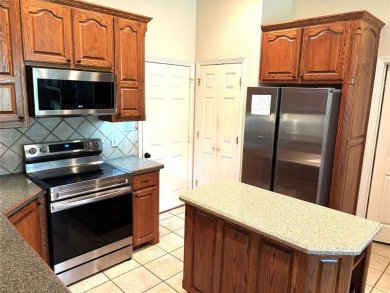 LOVELY 3-2-2 (with golf cart space) CUSTOM HOME IN PECAN on Nutcracker Golf Club in Texas - for sale on GolfHomes.com, golf home, golf lot