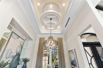 Nestled in the serene embrace of Bonita Springs, this on Bonita Bay West in Florida - for sale on GolfHomes.com, golf home, golf lot