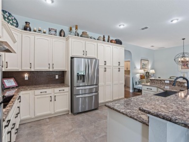 Welcome to this beautifully maintained 2017 custom home in the on Stonecrest Golf and Club Club in Florida - for sale on GolfHomes.com, golf home, golf lot