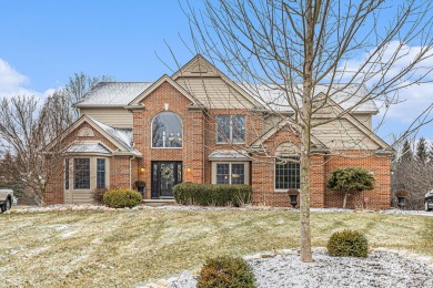 Peace and privacy are yours at this impressive brick home on a on Stonebridge Golf Club in Michigan - for sale on GolfHomes.com, golf home, golf lot