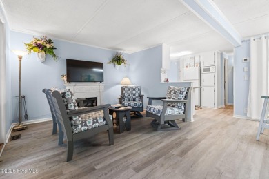 This charming residence is ideally located near the beach on Oyster Bay Golf Links in North Carolina - for sale on GolfHomes.com, golf home, golf lot